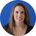 A profile image of a smiling woman with long brown hair, wearing a black top, set against a vibrant blue background.