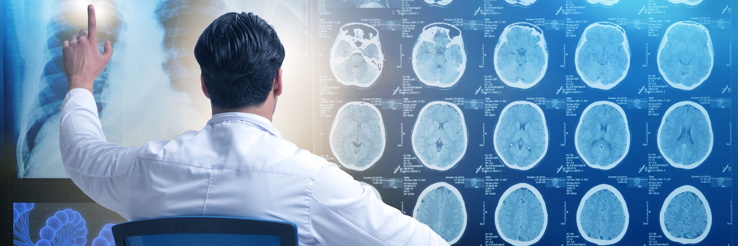 A male medical professional analyzes a series of brain mri scans on a digital screen while making notes with a digital pen, in a high-tech medical office setting.